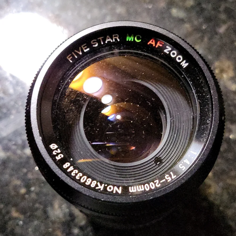 Minolta Maxxun auto focus f4.5 Zoom Lens 75-200mm Telephoto lens